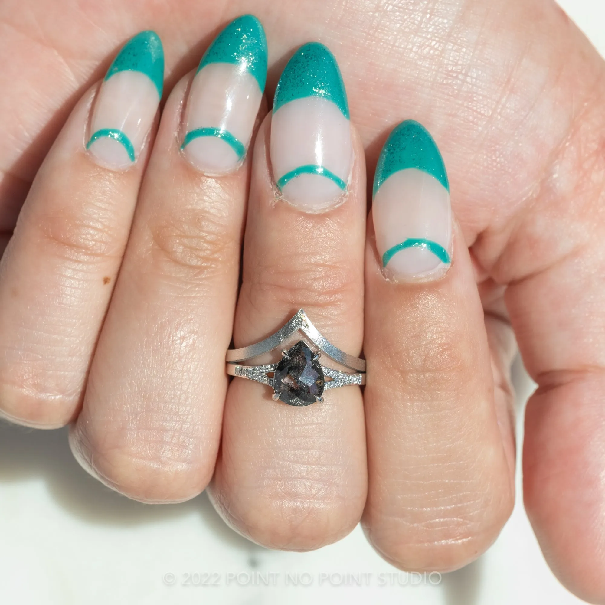 1.56 Carat Black Speckled Pear Diamond Engagement Ring, River Setting, 14K White Gold