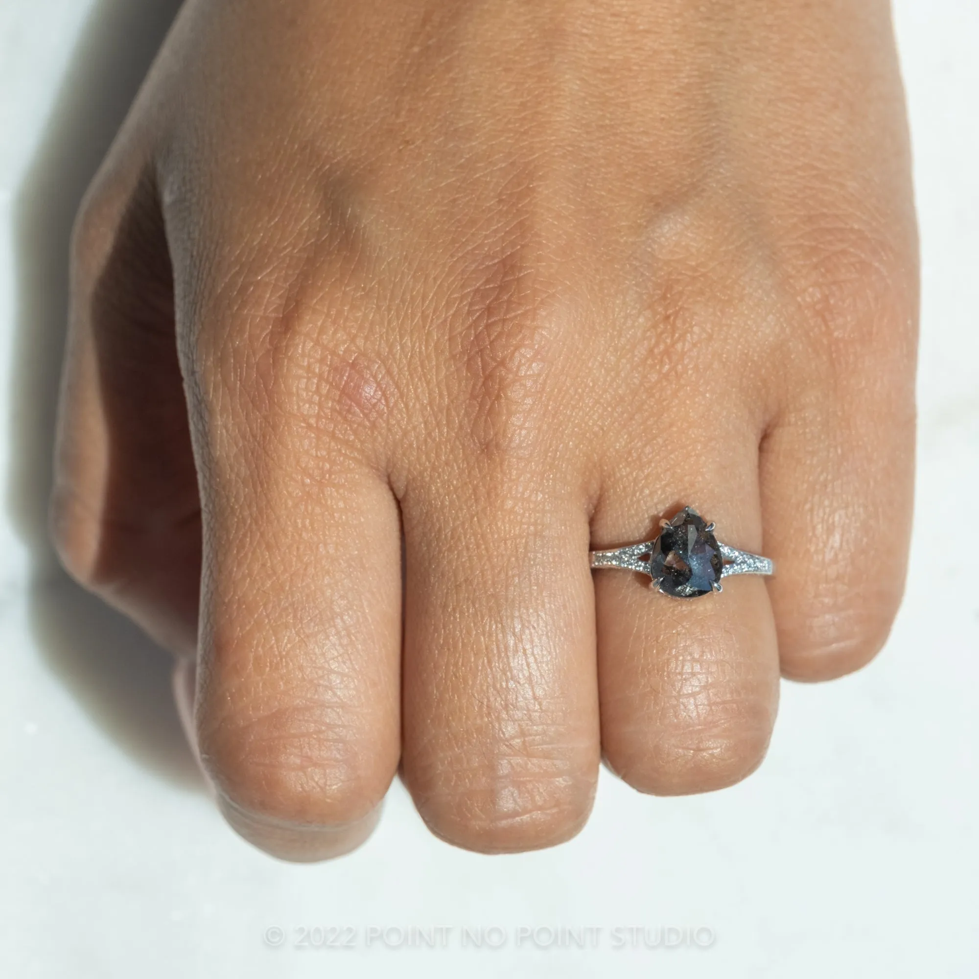 1.56 Carat Black Speckled Pear Diamond Engagement Ring, River Setting, 14K White Gold