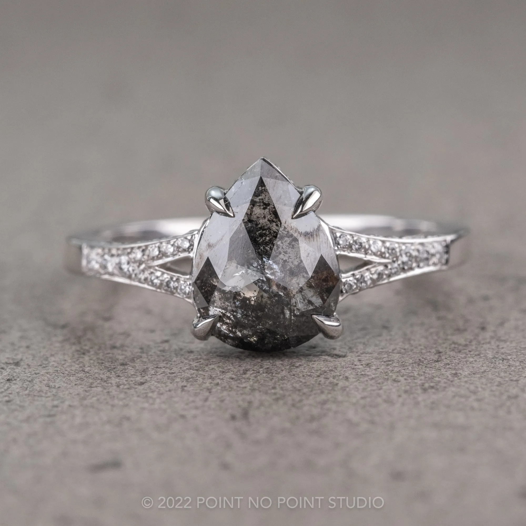 1.56 Carat Black Speckled Pear Diamond Engagement Ring, River Setting, 14K White Gold