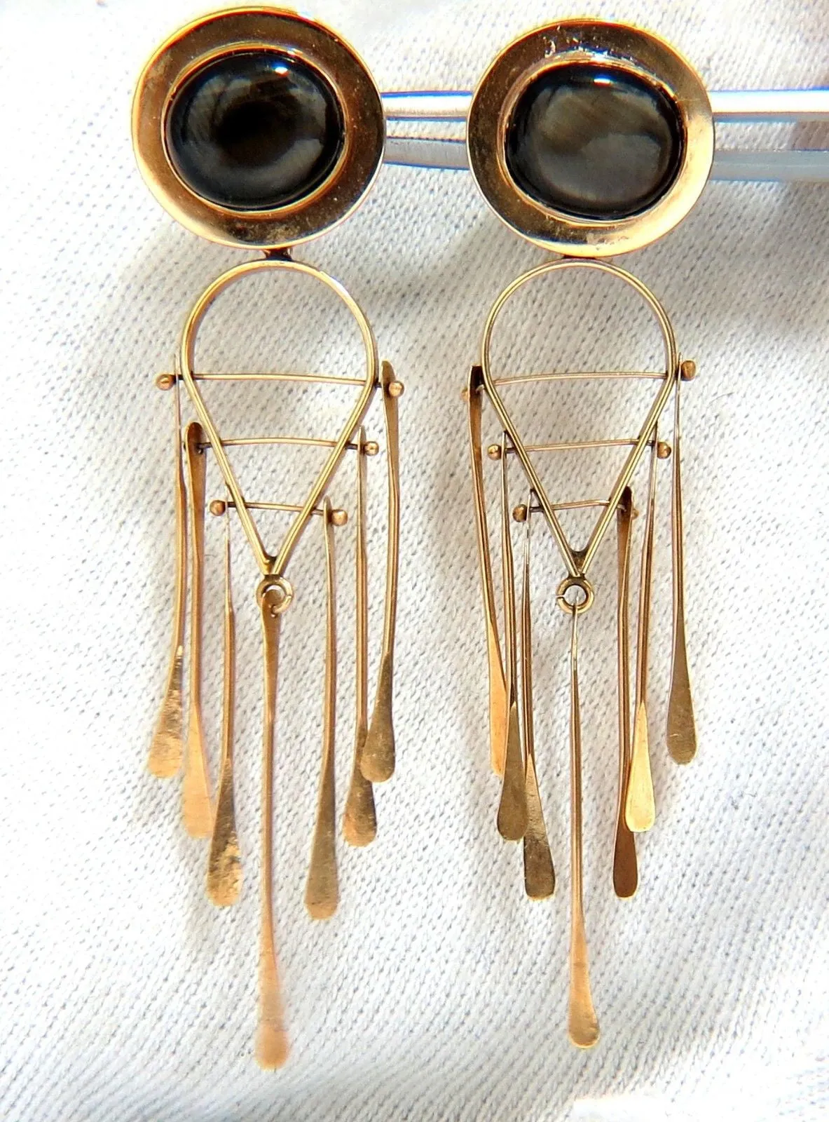 Art Deco Black star symbolic dangle earrings 14kt
