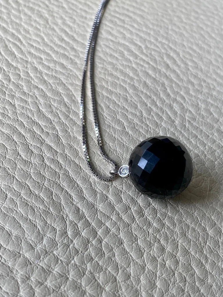 Brilliant! Black onyx faceted orb pendant necklace set in 18k white gold with 0.05 ct brilliant cut diamond by Ole Lynggaard