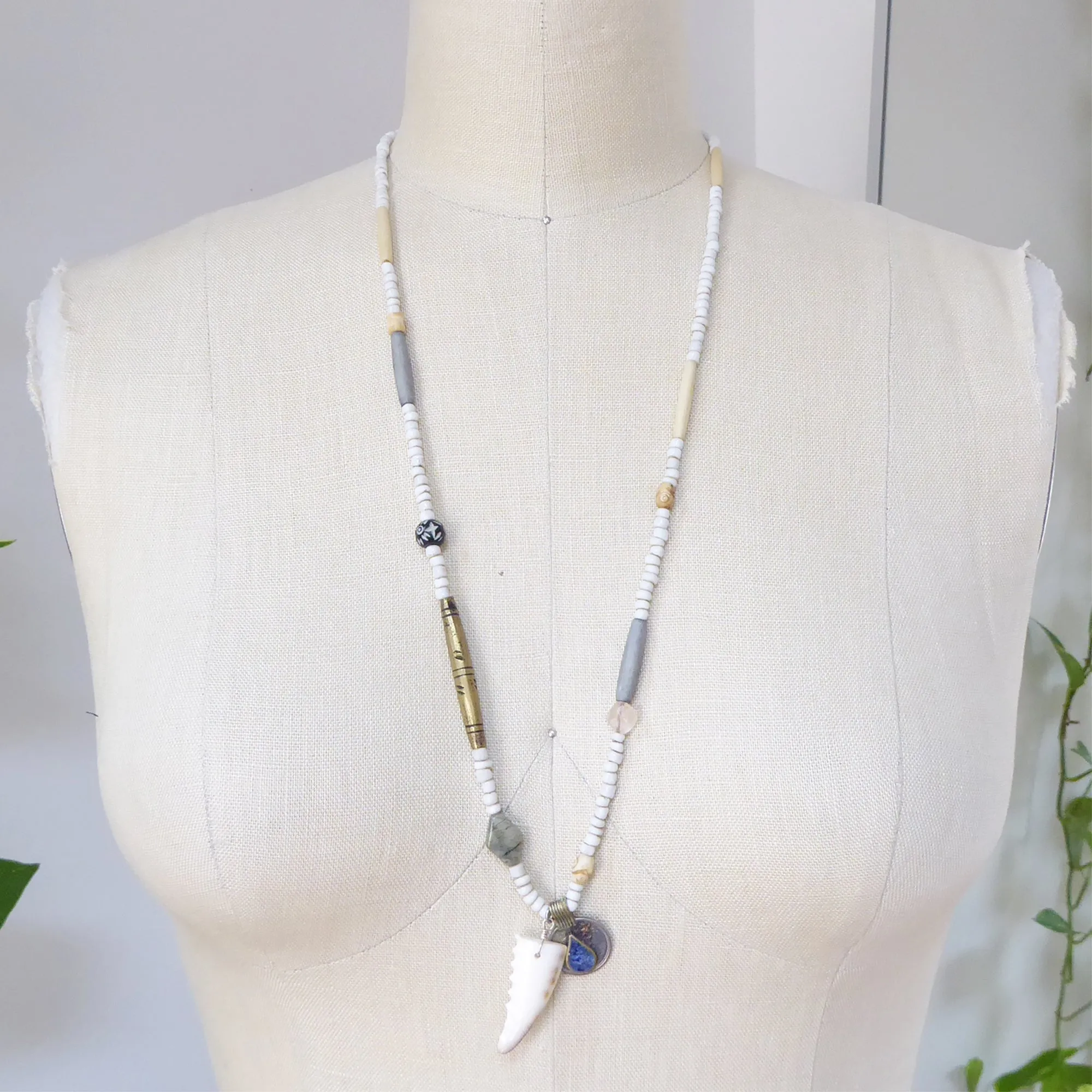 Cowrie shell and lapis lazuli necklace