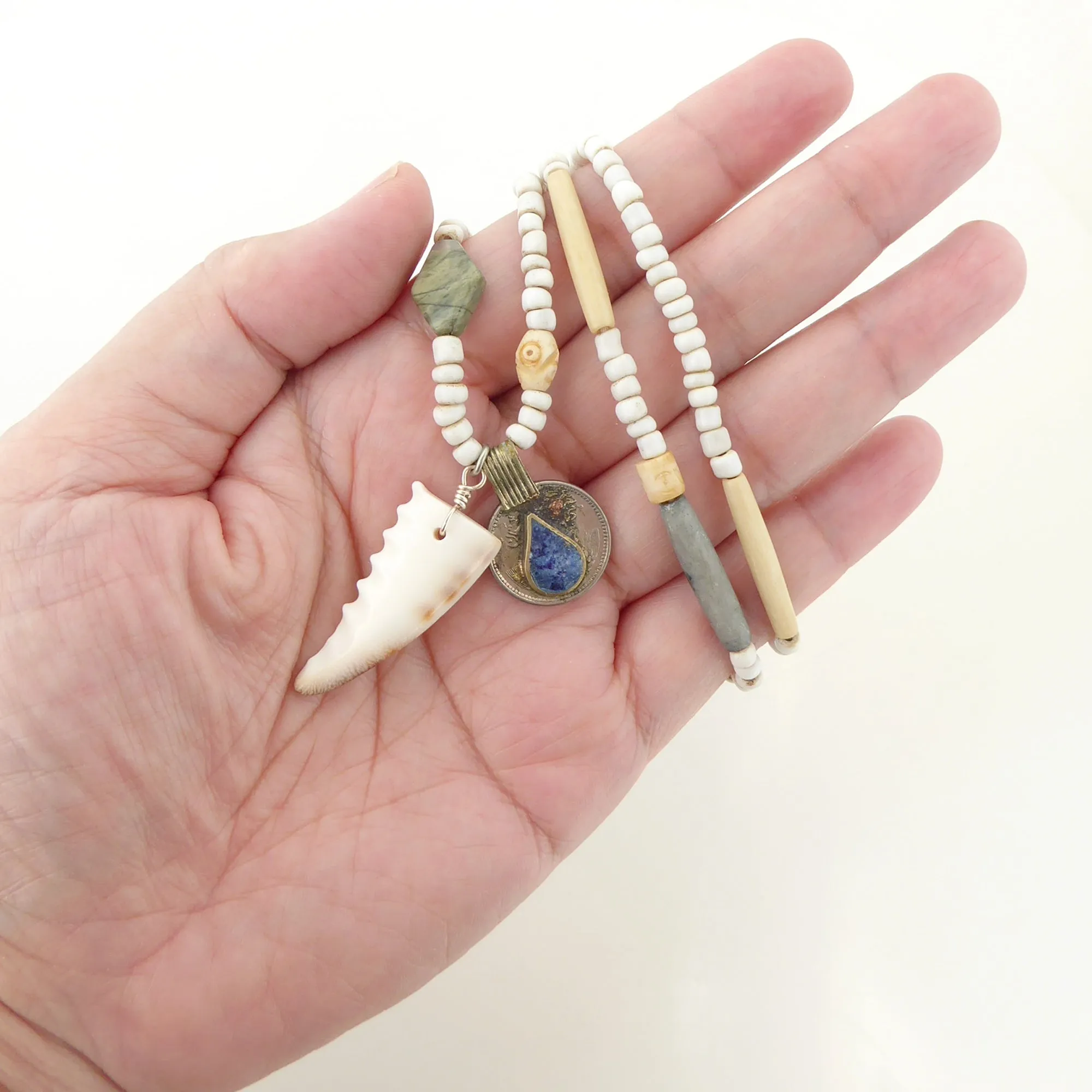 Cowrie shell and lapis lazuli necklace