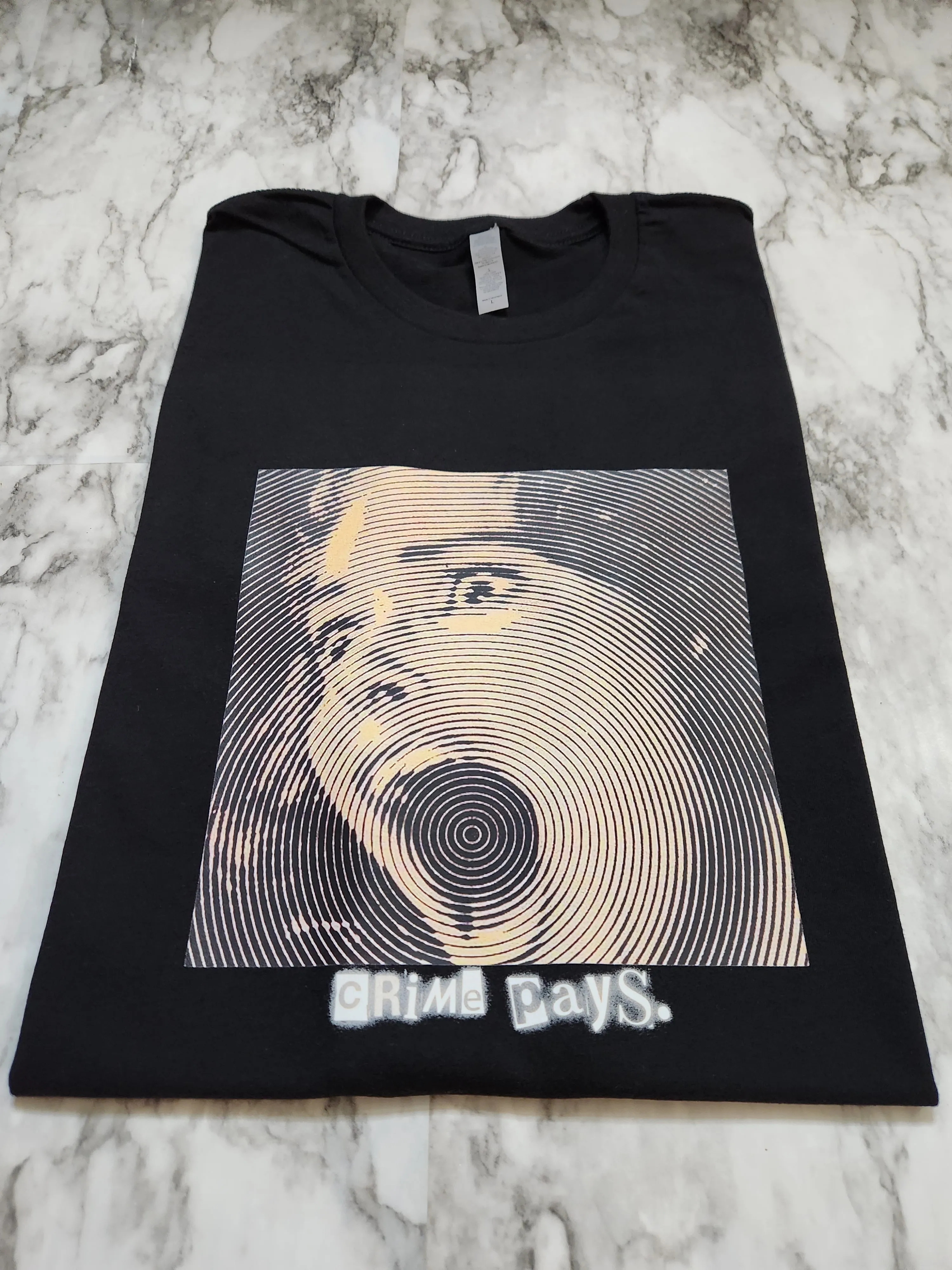Crime Pays. T-Shirt (Black)