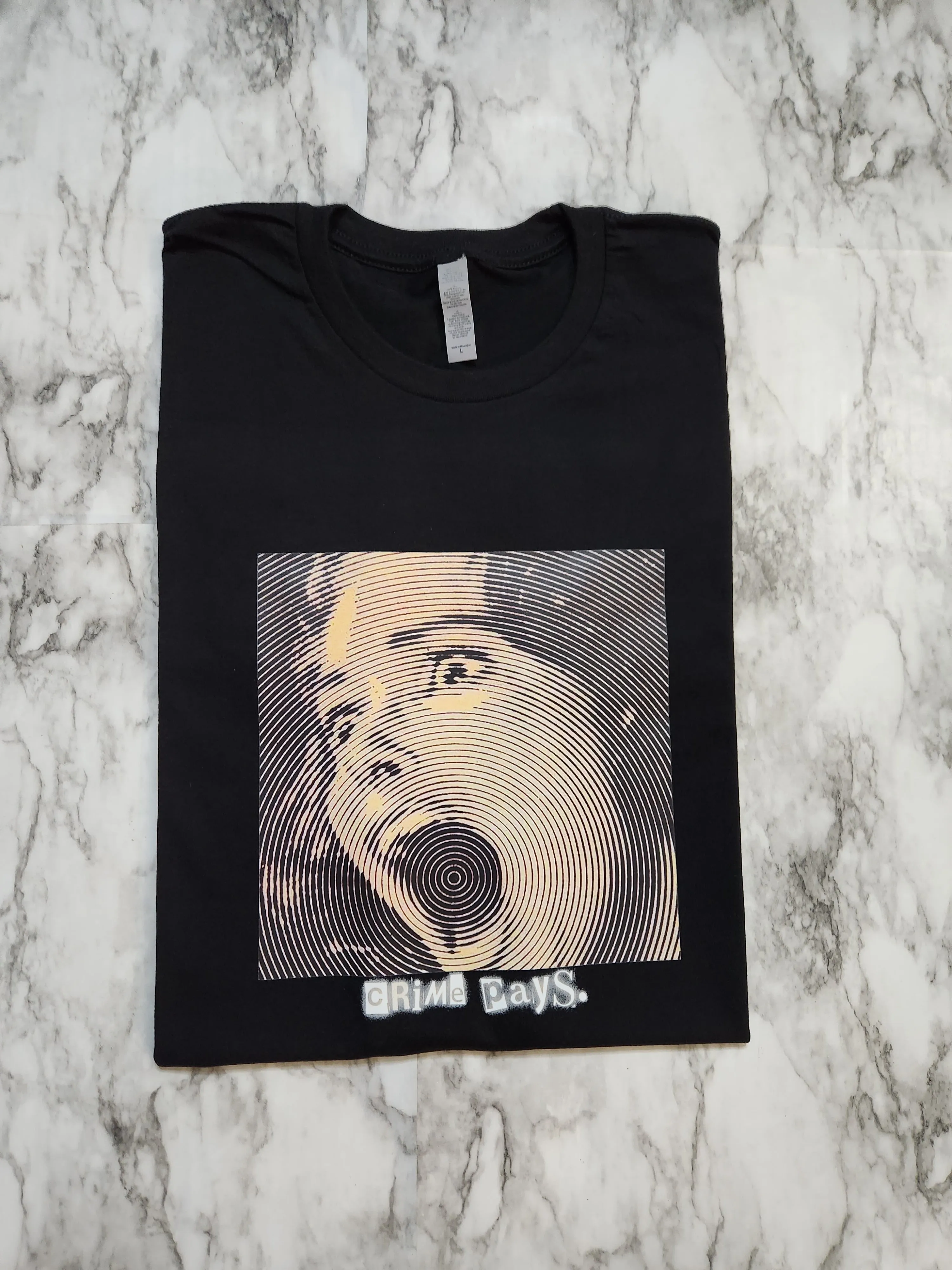 Crime Pays. T-Shirt (Black)