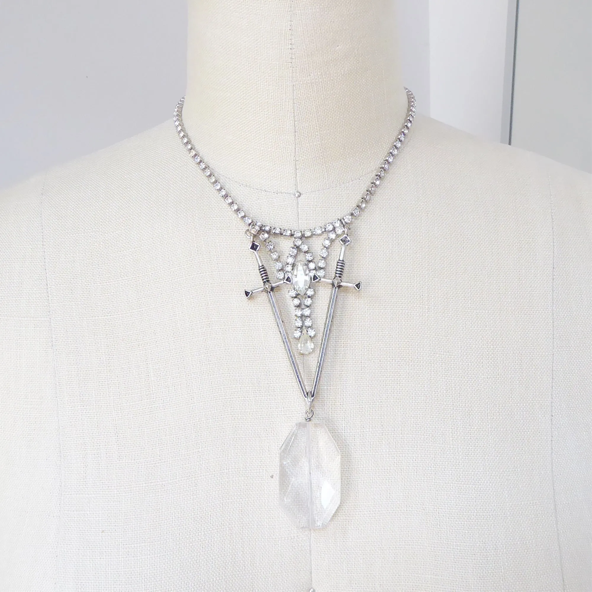 Dual sword necklace