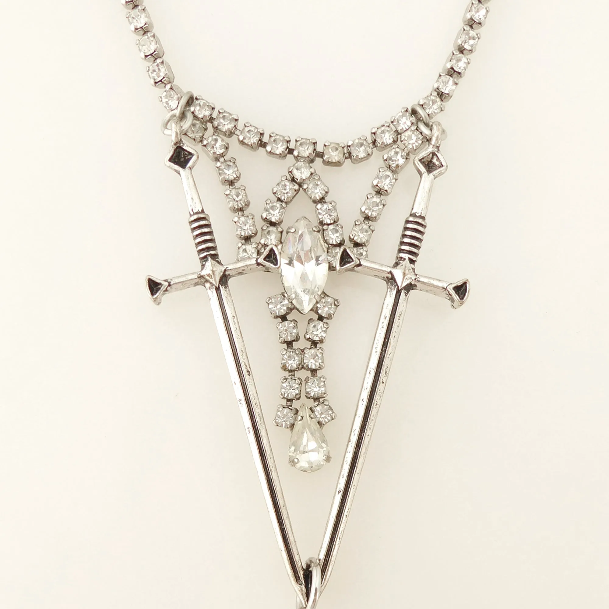 Dual sword necklace