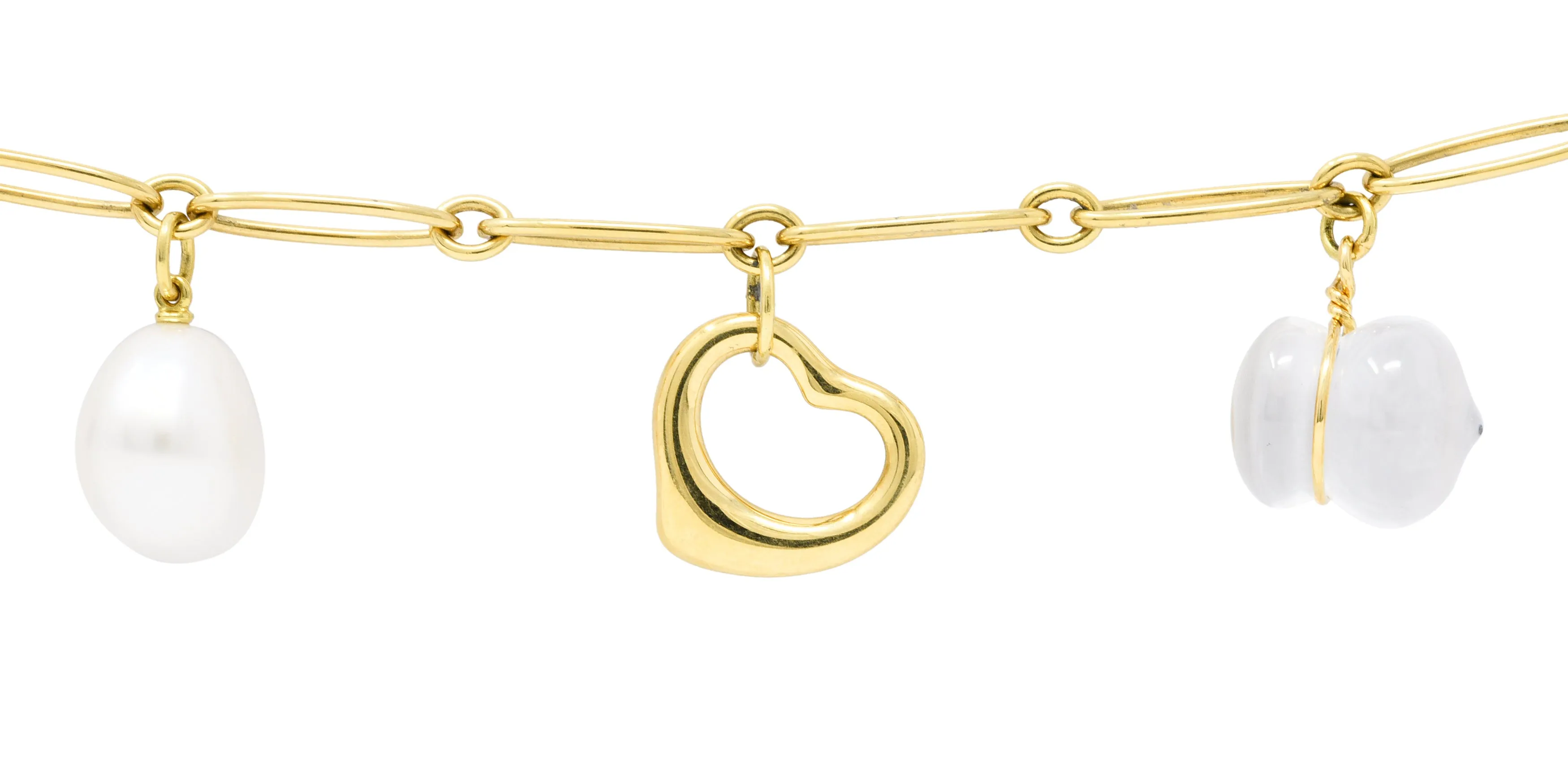 Elsa Peretti Tiffany & Co. Jade Agate Rock Crystal 18 Karat Gold Five Charm Icon Bracelet