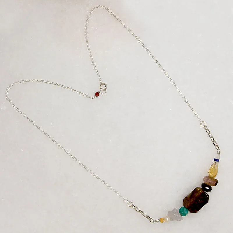 Energetic Gemstone Arc on Silver Necklace by Brin