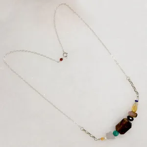 Energetic Gemstone Arc on Silver Necklace by Brin