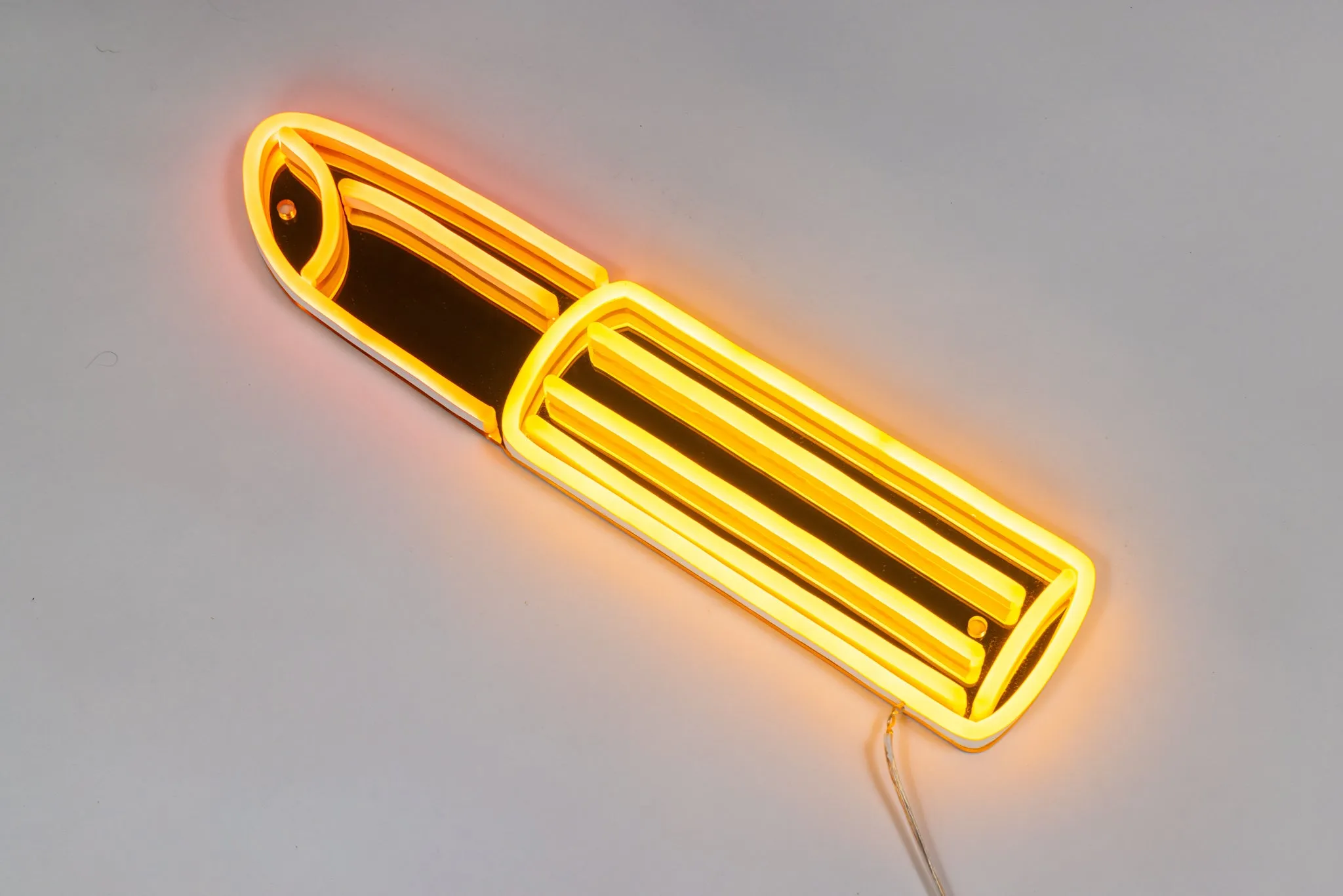 Golden Lipstick Neon Sign by Tom Wesselmann
