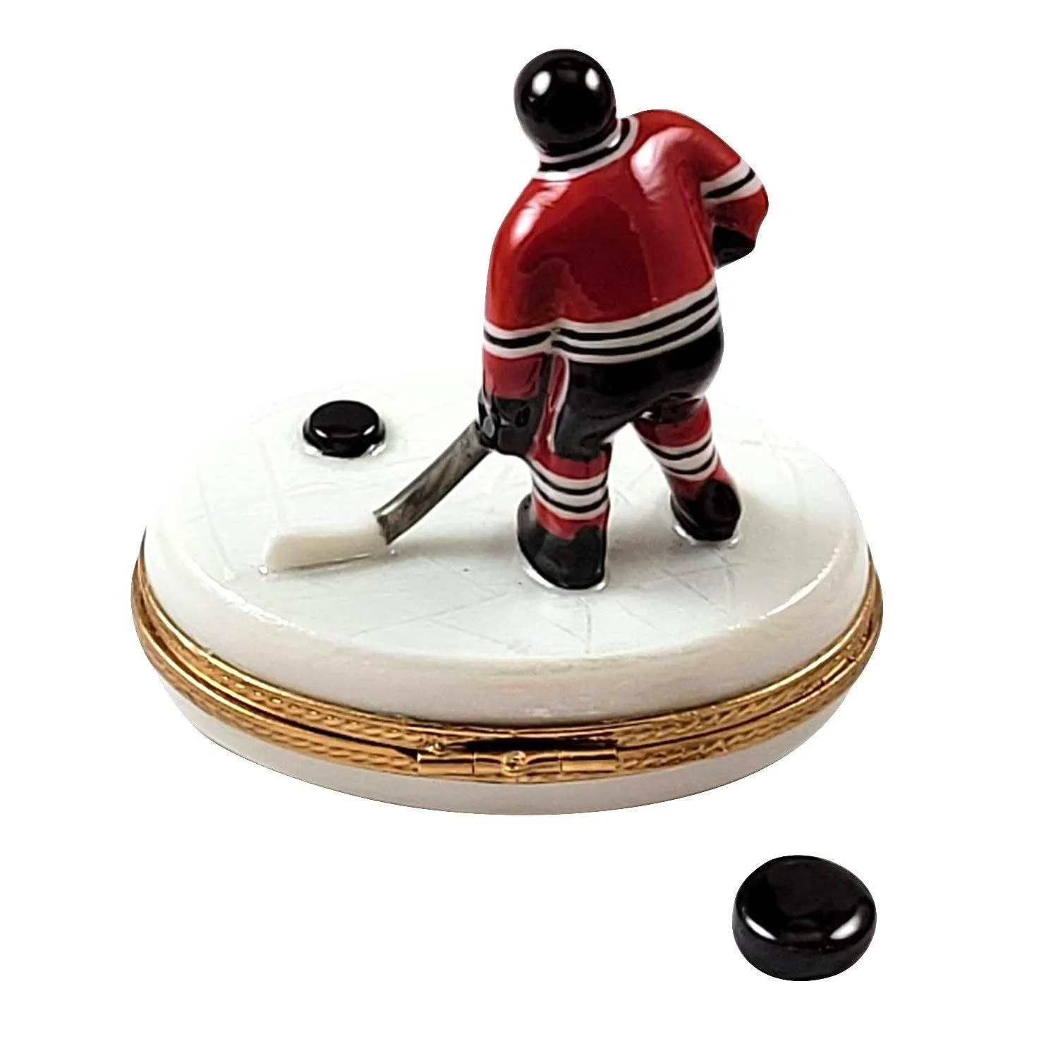 Hockey Player with Removable Puck