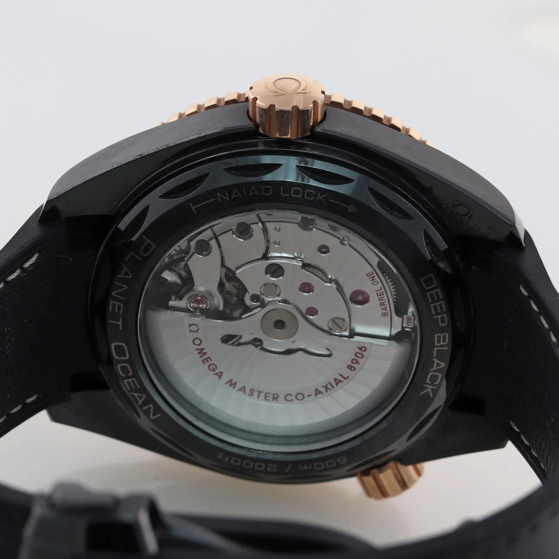 MINT PAPERS Omega Planet Ocean Deep Black 215.63.46.22.01.001 Ceramic Rose Watch