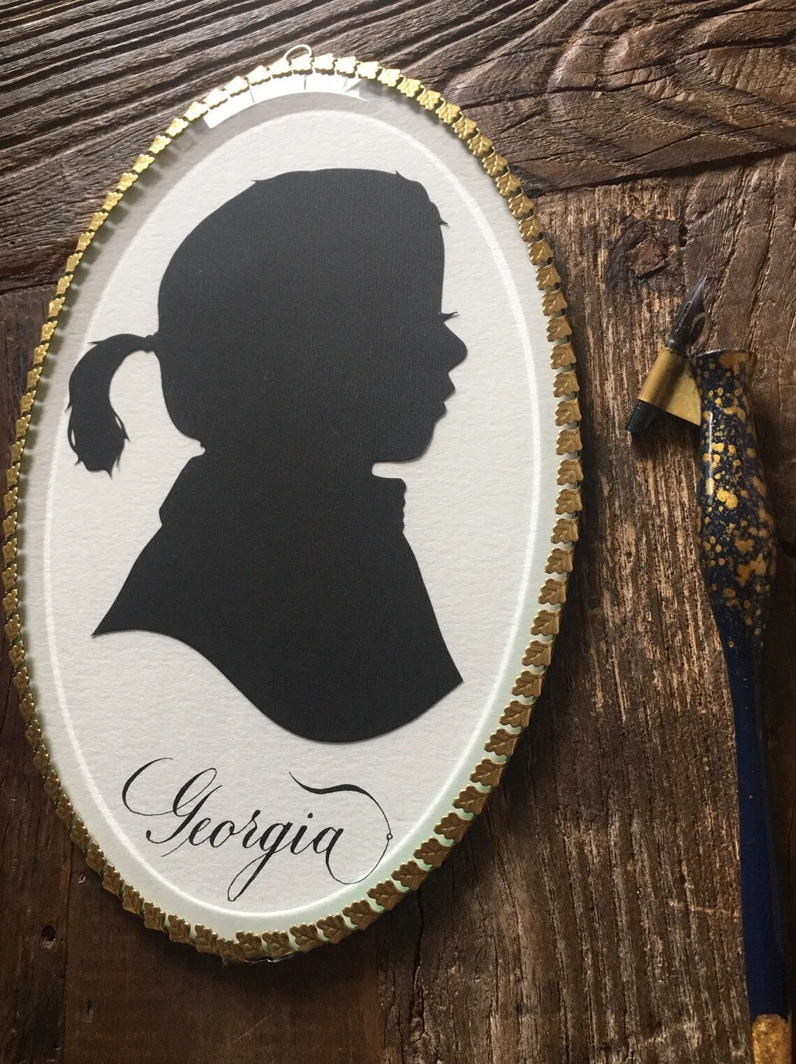 Oval Framed Custom Hand Cut Silhouette Art  -  Beveled Glass framed Silhouette Keepsake