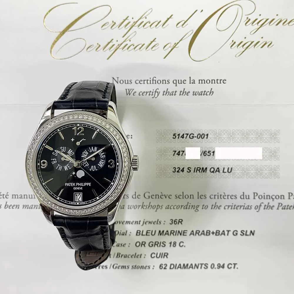 Patek Philippe Complications 5147G-001 Annual Calendar Moon Phase Blue Dial Mar 2022