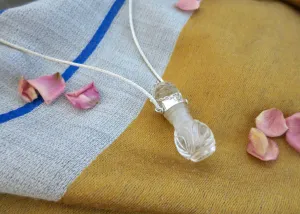 Rare, collectible, hand-carved rock crystal perfume bottle with a handmade chain