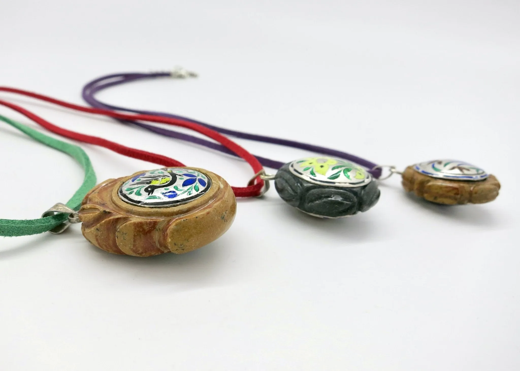 Rare, collectible, reversible carved gemstone pendants with fine enamel work (smaller)