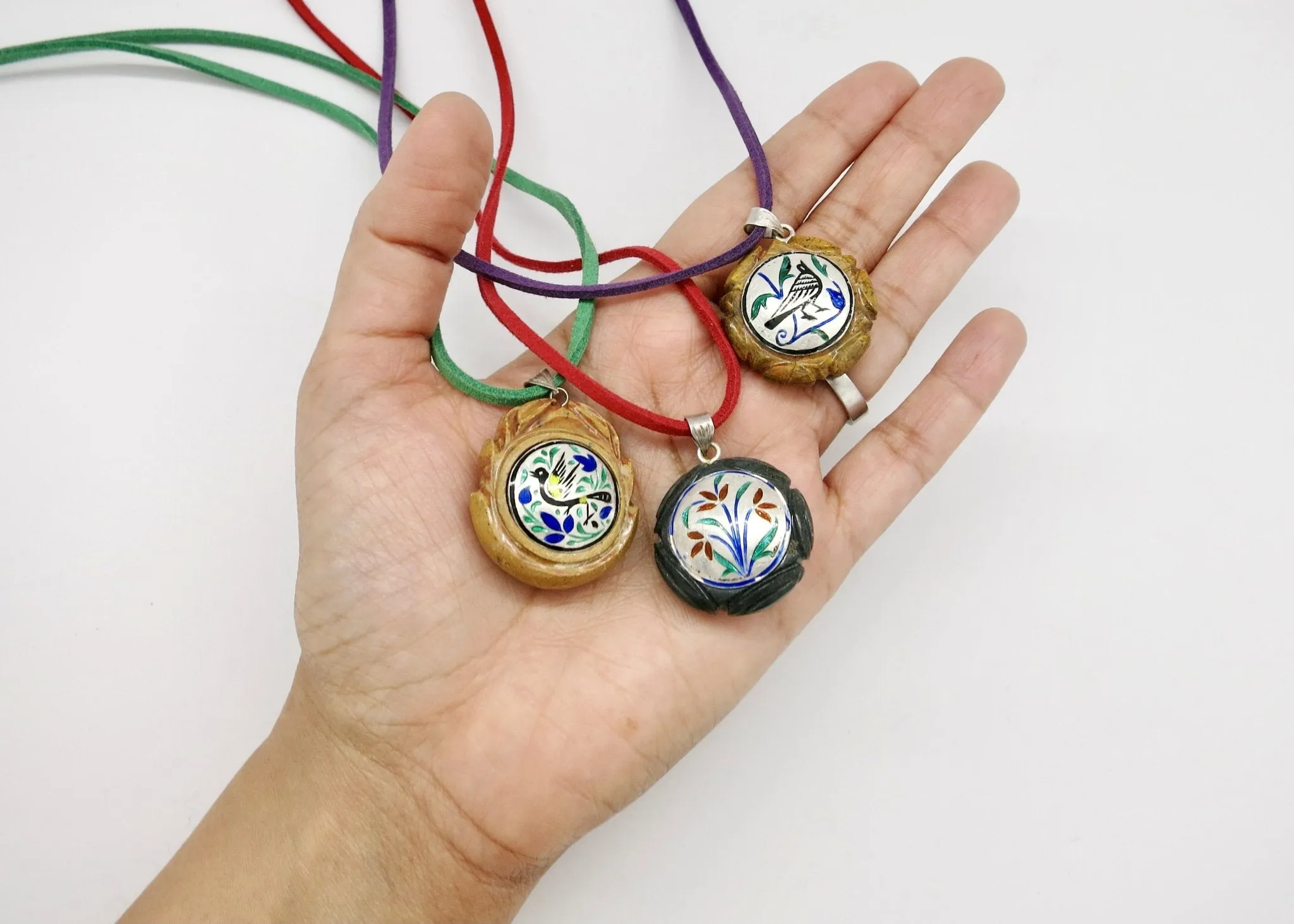 Rare, collectible, reversible carved gemstone pendants with fine enamel work (smaller)
