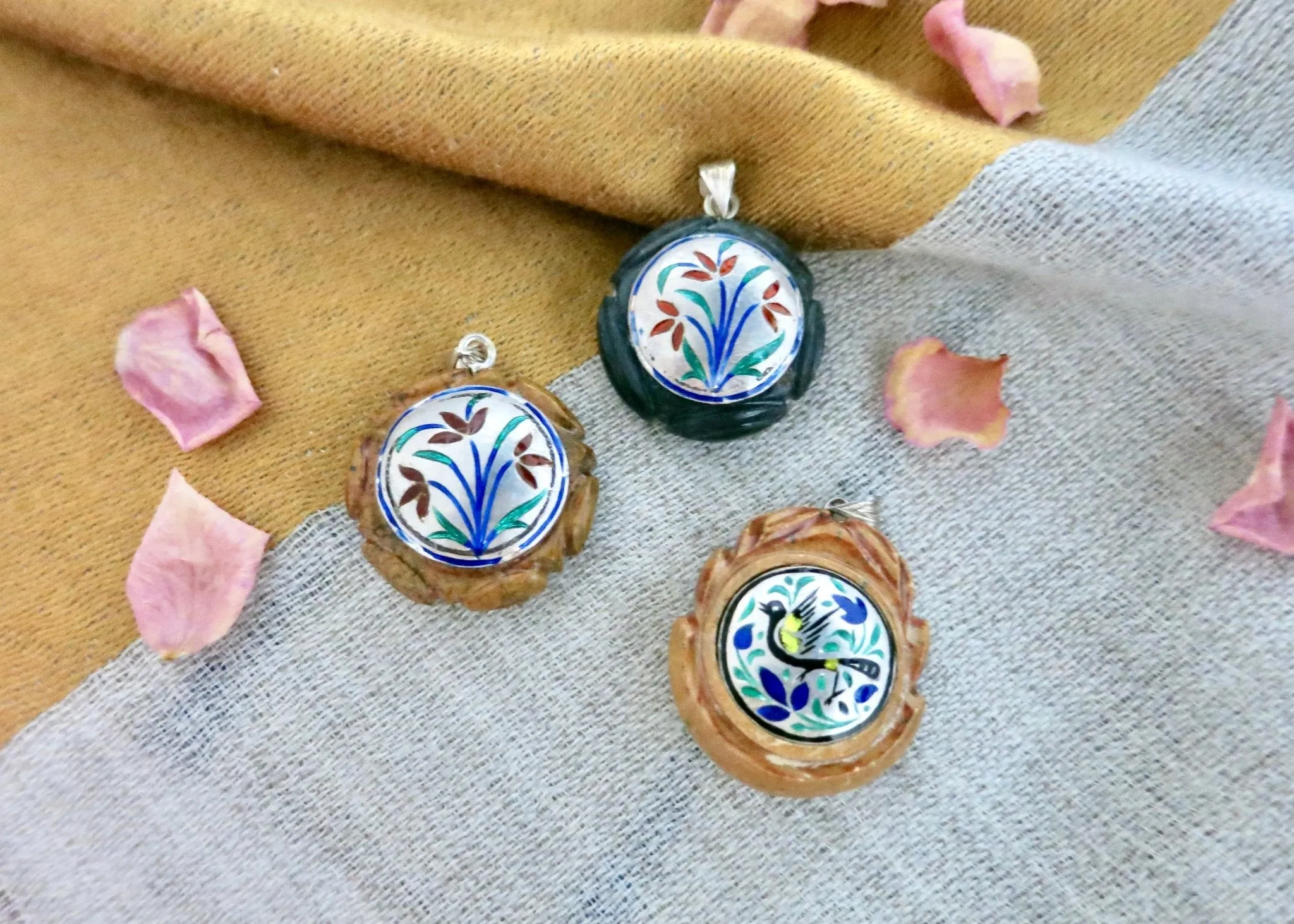 Rare, collectible, reversible carved gemstone pendants with fine enamel work (smaller)