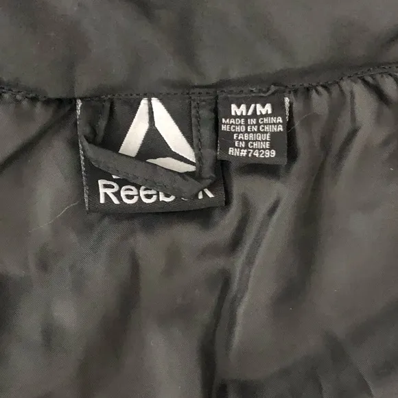 Reebok Black &amp; Black Heather Fleece Women’s Puffer Jacket Medium