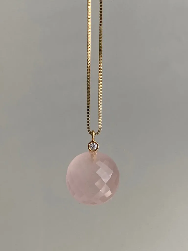 Sparkling! Rose quartz faceted orb pendant necklace set in 18k gold with 0.05 ct brilliant cut diamond by Ole Lynggaard
