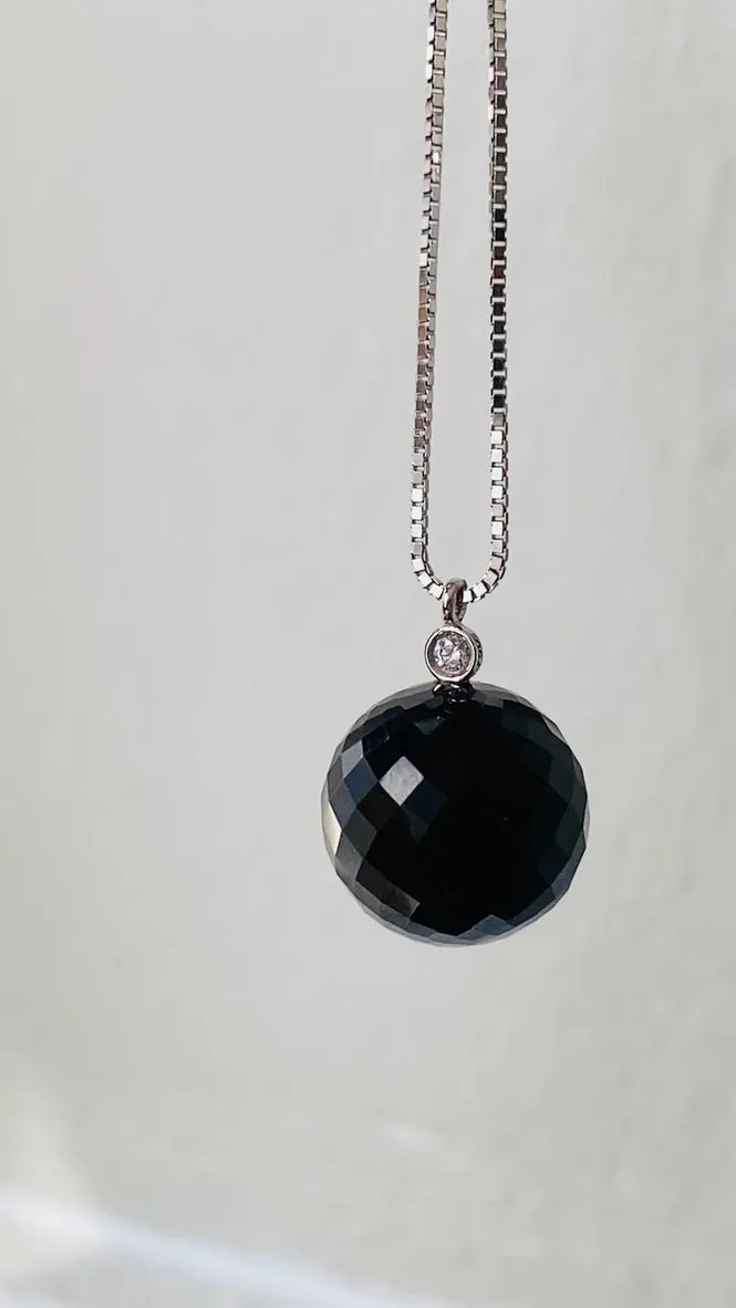 Sparkling! Rose quartz faceted orb pendant necklace set in 18k gold with 0.05 ct brilliant cut diamond by Ole Lynggaard